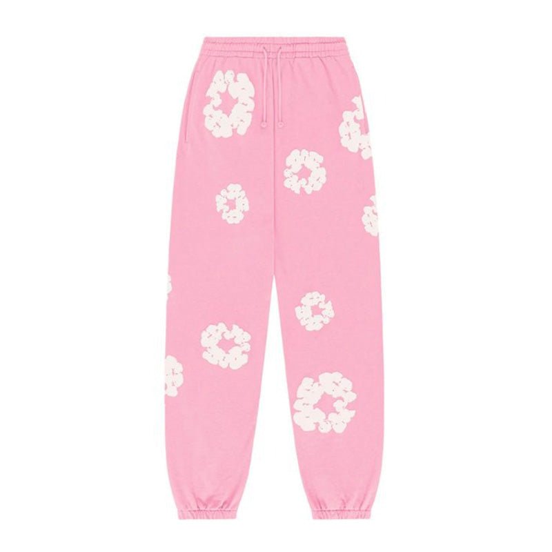 DENIM TEARS – Pantaloni rosa